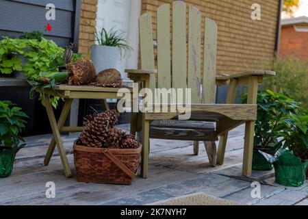 large pine cones in a basket, on a backyard autumn still life Stock Photo