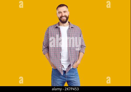 Portrait of handsome smiling Caucasian young man in stylish comfortable casual clothes. Stock Photo