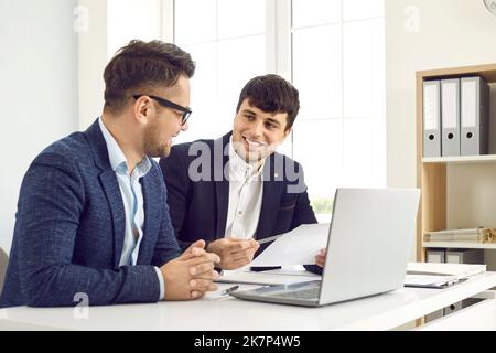 Business people in office discuss, analyze and plan new startup project idea presentation. Stock Photo