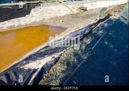 Construction work taking place on the refurbishment of the Montgomery Canal on the border of England and Wales in Shropshire. Stock Photo