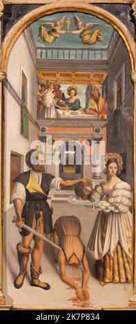 BELLANO, ITALY - JULY 20, 2022: The ranaissance painting of Decapitation of St. John Baptist in the church Chiesa dei santi Nazareo e Celso Stock Photo