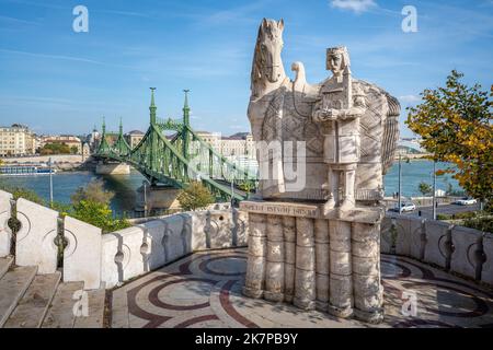 Statue of St Stephen at Gellert Hill with Liberty Bridge - Budapest, Hungary Stock Photo