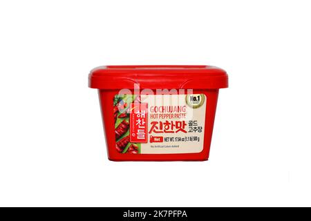 A container of CJ Haechandle 제일제당 Gochujang Hot Pepper Paste 고추장 isolated on a white background. cutout image for illustration and editorial use. Stock Photo
