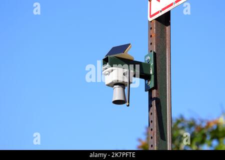 An experimental, real-time flood sensor mounted on a pole in Brooklyn's Gowanus neighborhood, an area vulnerable to flooding and inundation. Stock Photo