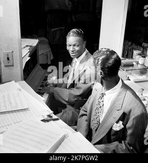 Nat King Cole, Nathaniel Adams Coles (1919 – 1965), Nat King Cole, an American singer, jazz pianist, and actor. Stock Photo