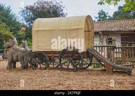 Toy cart with horses at a playground in Denmark Stock Photo