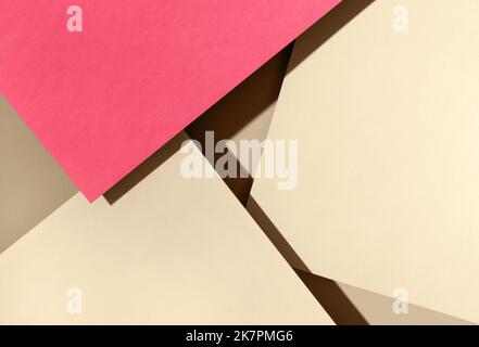 Paper for pastel overlap in vivid pink and ivory colors for background, banner, presentation template. Creative trendy background design in natural colors. Background in 3d style. Stock Photo