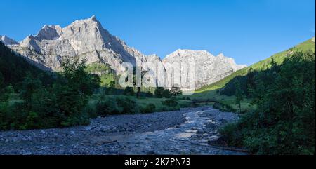 The morning panorama of north walls of Karwendel mountains - walls of Spritzkar spitze and Grubenkar spitze from Enger tall  - Grosser Ahornboden wall Stock Photo