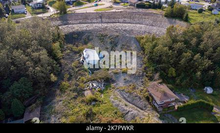 Aerial view of the consolidation work that is in progress after a landslide destroyed a house in the La Baie district of Saguenay September 10, 2022. Stock Photo