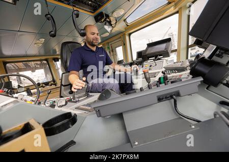 Jean-Philippe Picard, tug boat captain for Groupe Ocean, prepare his ship before leaving port in Quebec city on August 25, 2022. Stock Photo