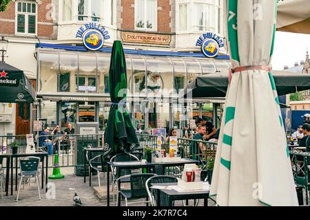 The Bulldog Palace is a cafe, coffee shop that sells marijuana and has outdoor seating in Amsterdam Stock Photo