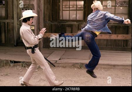 Chuck Norris Scene Film: Breaker! Breaker! (1977) Characters: John David 'J.D.' Dawes  Director: Don Hulette 01 April 1977   **WARNING** This Photograph is for editorial use only and is the copyright of PARAGON FILMS and/or the Photographer assigned by the Film or Production Company and can only be reproduced by publications in conjunction with the promotion of the above Film. A Mandatory Credit To PARAGON FILMS is required. The Photographer should also be credited when known. No commercial use can be granted without written authority from the Film Company. Stock Photo