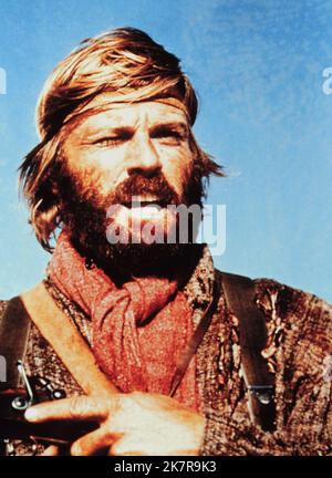 Robert Redford Film: Jeremiah Johnson (1972) Characters: Jeremiah Johnson  Director: Sydney Pollack 10 September 1972   **WARNING** This Photograph is for editorial use only and is the copyright of WARNER BROS and/or the Photographer assigned by the Film or Production Company and can only be reproduced by publications in conjunction with the promotion of the above Film. A Mandatory Credit To WARNER BROS is required. The Photographer should also be credited when known. No commercial use can be granted without written authority from the Film Company. Stock Photo