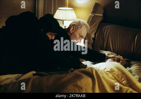 Jason Miller, Max Von Sydow & Linda Blair Film: The Exorcist (USA 1973) Characters: Father Karras,Father Merrin,Regan  Director: William Friedkin 26 December 1973   **WARNING** This Photograph is for editorial use only and is the copyright of WARNER BROS. and/or the Photographer assigned by the Film or Production Company and can only be reproduced by publications in conjunction with the promotion of the above Film. A Mandatory Credit To WARNER BROS. is required. The Photographer should also be credited when known. No commercial use can be granted without written authority from the Film Company Stock Photo