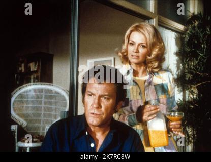 Earl Holliman & Angie Dickinson Television: Police Woman (1974) Characters: Lt. Bill Crowley, Sgt. Suzanne 'Pepper' Anderson  Director: Jack Hanrahan 13 September 1974   **WARNING** This Photograph is for editorial use only and is the copyright of COLUMBIA and/or the Photographer assigned by the Film or Production Company and can only be reproduced by publications in conjunction with the promotion of the above Film. A Mandatory Credit To COLUMBIA is required. The Photographer should also be credited when known. No commercial use can be granted without written authority from the Film Company. Stock Photo