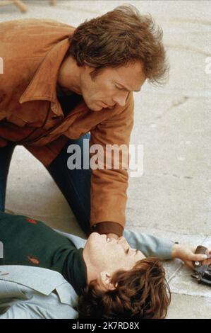 Clint Eastwood & Tyne Daly Film: The Enforcer; Dirty Harry 3: The Enforcer (USA 1976) Characters: Insp. 'Dirty' Harry Callahan & Insp. Kate Moore  Director: James Fargo 22 December 1976   **WARNING** This Photograph is for editorial use only and is the copyright of WARNER BROS. and/or the Photographer assigned by the Film or Production Company and can only be reproduced by publications in conjunction with the promotion of the above Film. A Mandatory Credit To WARNER BROS. is required. The Photographer should also be credited when known. No commercial use can be granted without written authorit Stock Photo