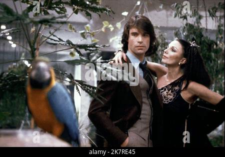 Oliver Tobias & Joan Collins Film: The Stud (UK 1978) Characters: Tony Blake, Fontaine Khaled  Director: Quentin Masters 17 August 1978   **WARNING** This Photograph is for editorial use only and is the copyright of ARTOC FILMS and/or the Photographer assigned by the Film or Production Company and can only be reproduced by publications in conjunction with the promotion of the above Film. A Mandatory Credit To ARTOC FILMS is required. The Photographer should also be credited when known. No commercial use can be granted without written authority from the Film Company. Stock Photo
