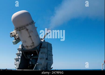 Gunney Shell NAVAL OFFICER HAS GUNNERY TRAINING Photo Shows: A sun lieutenant who is ...