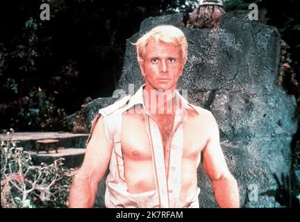 Ron Ely Film: Doc Savage: The Man Of Bronze (1975) Characters: Clark 'Doc' Savage Jr.  Director: Michael Anderson 01 June 1975   **WARNING** This Photograph is for editorial use only and is the copyright of WARNER BROS and/or the Photographer assigned by the Film or Production Company and can only be reproduced by publications in conjunction with the promotion of the above Film. A Mandatory Credit To WARNER BROS is required. The Photographer should also be credited when known. No commercial use can be granted without written authority from the Film Company. Stock Photo