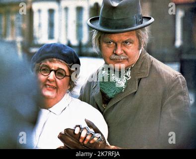 Rita Webb & Benny Hill Film: The Best Of Benny Hill (1974) Characters: Various Roles & Himself / Fred Scuttle / Mr. Chow Mein / Tommy Tupper / Mervyn Cruddy / Various  Director: John Robins 01 December 1974   **WARNING** This Photograph is for editorial use only and is the copyright of THAMES TV and/or the Photographer assigned by the Film or Production Company and can only be reproduced by publications in conjunction with the promotion of the above Film. A Mandatory Credit To THAMES TV is required. The Photographer should also be credited when known. No commercial use can be granted without w Stock Photo