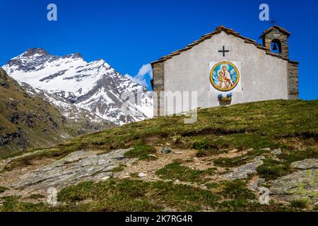 Chapel church above Idyllic Dolomites Alpine landscape, Gran Paradiso, Italy Stock Photo