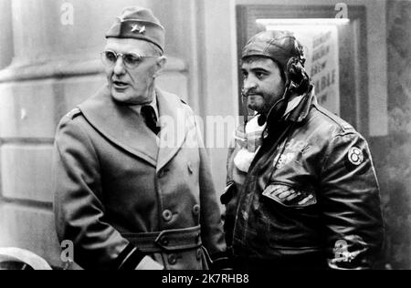 Robert Stack & John Belushi Film: 1941 (USA 1979) Characters: Maj. Gen. Joseph W. Stilwell & Capt. Wild Bill Kelso  Director: Steven Spielberg 13 December 1979   **WARNING** This Photograph is for editorial use only and is the copyright of COLUMBIA and/or the Photographer assigned by the Film or Production Company and can only be reproduced by publications in conjunction with the promotion of the above Film. A Mandatory Credit To COLUMBIA is required. The Photographer should also be credited when known. No commercial use can be granted without written authority from the Film Company. Stock Photo