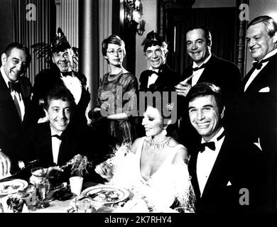 Guy Lombardo, David Wayne, Barbara Rush, Ray Walston, David Doyle, Farley Granger, Joan Collins & Charles Robinson Film: Ellery Queen (1975) Characters: ,Inspector Richard Queen,,,,, &  Director: Davis Greene 23 March 1975   **WARNING** This Photograph is for editorial use only and is the copyright of The Film Company and/or the Photographer assigned by the Film or Production Company and can only be reproduced by publications in conjunction with the promotion of the above Film. A Mandatory Credit To The Film Company is required. The Photographer should also be credited when known. No commercia Stock Photo