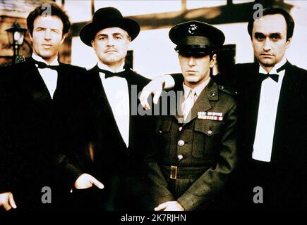 James Caan, Marlon Brando, Al Pacino & John Cazale Film: The Godfather (USA 1972) Characters: Santino 'Sonny' Corleone,Don Vito Corleone,Michael Corleone & Fredo Corleone  / Literaturverfilmung (Based On The Book By Mario Puzo) Director: Francis Ford Coppola 14 March 1972   **WARNING** This Photograph is for editorial use only and is the copyright of PARAMOUNT PICTURES and/or the Photographer assigned by the Film or Production Company and can only be reproduced by publications in conjunction with the promotion of the above Film. A Mandatory Credit To PARAMOUNT PICTURES is required. The Photogr Stock Photo