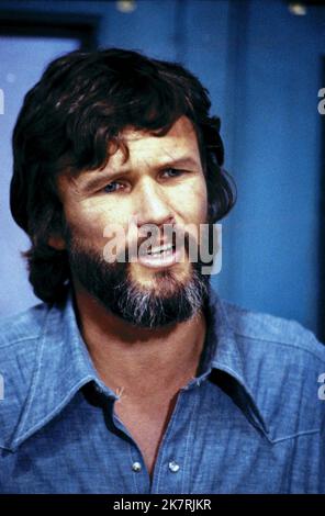Kris Kristofferson Film: Alice Doesn'T Live Here Anymore (1974) Characters: David  Director: Martin Scorsese 09 September 1974   **WARNING** This Photograph is for editorial use only and is the copyright of WARNER BROS and/or the Photographer assigned by the Film or Production Company and can only be reproduced by publications in conjunction with the promotion of the above Film. A Mandatory Credit To WARNER BROS is required. The Photographer should also be credited when known. No commercial use can be granted without written authority from the Film Company. Stock Photo