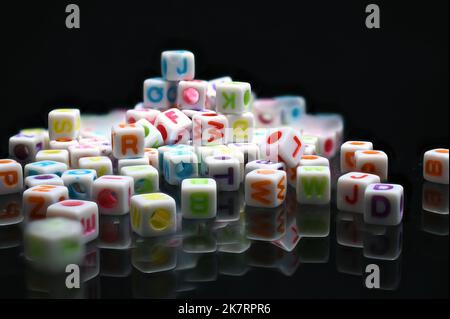 Miniature plastic Letter Beads close up Stock Photo