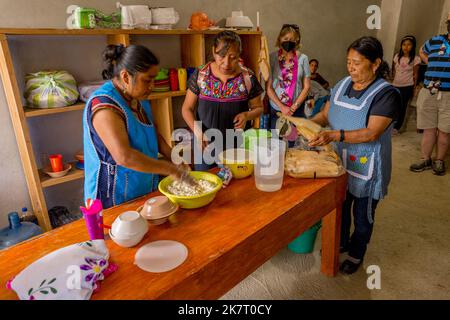 Women making Tamales in the Mixtec village of San Jose Contreras near Oaxaca City, Mexico. Stock Photo