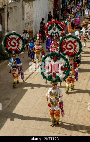 View of the Parade of Delegations to the Guelaguetza in the streets of San Antonino Castillo Velasco near Oaxaca, Mexico. Stock Photo