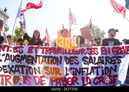Student procession of Mirail, Le Poing Leve and Revolution Permanente, behind the banner, Students and Workers on strike, for the increase of salaries, and the indexation on the inflation, to the Bosses to pay the crisis. The CGT and FO trade unions called for a nationwide strike for higher salaries, and against the government's requisitioning of fuel refineries to force some strikers back into opening fuel depots. Unions in other industries and the public sector have also announced action to protest against the twin impact of soaring energy prices and overall inflation on the cost of living. Stock Photo