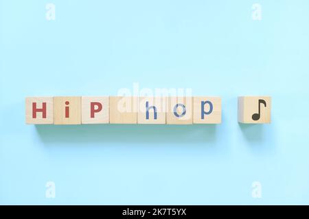 Hip hop music genre or style concept. Creative flat lay typography composition in blue background. Stock Photo
