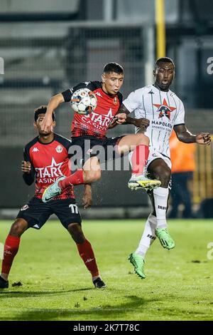 Seraing's Sami Lahssaini and Cercle's Kevin Denkey fight for the ball ...