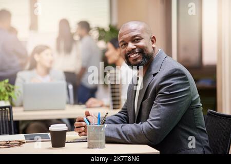 A strong leader makes a strong team. a businessman in his office. Stock Photo