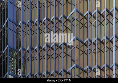 architectural background - skyscraper windows, modern building concept. glass and metal, geometric shapes. Stock Photo