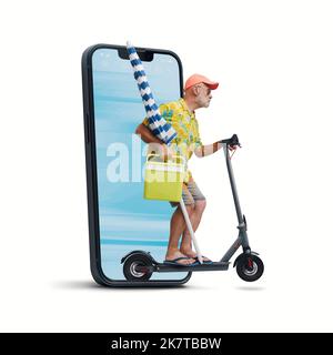 Funny senior tourist riding an electric scooter and going to the beach, he is coming out from a smartphone screen, isolated on white background Stock Photo