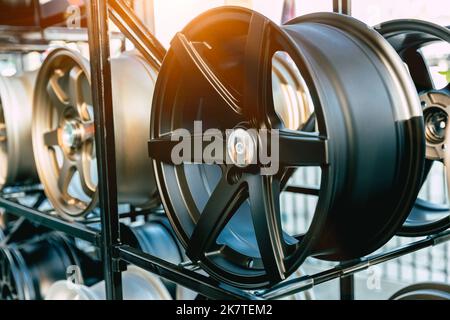sport luxury alloy wheel car rims in garage store for sale Stock Photo