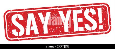SAY YES! text written on red grungy stamp sign. Stock Photo