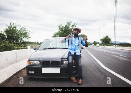 Boy posing roadside - PixaHive