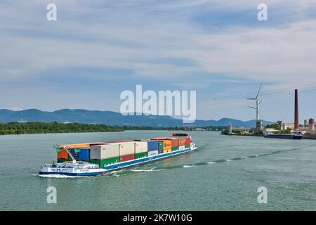 River transport in Le Pouzin (south eastern France): container ship Le Guardiana on the River Rhone viewed from Fos, in the direction of Lyon Stock Photo