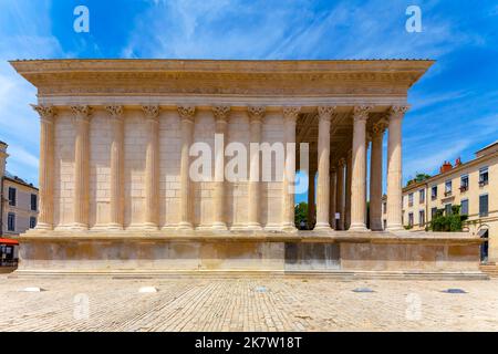 The Maison Carrée is an ancient building in Nîmes, France. The temple is believed to have been built possibly around 19BC, commissioned by Marcus Agri Stock Photo