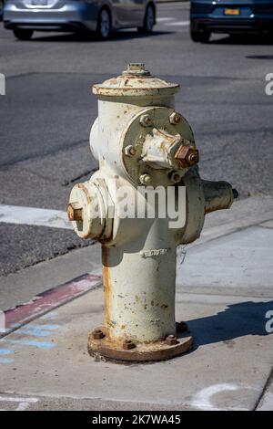 An old fire hydrant on the streets of Los Angeles, ready to be used in a fire or calamity, State of California, America Stock Photo