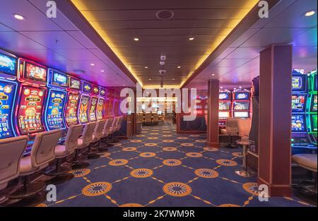 View of the casino and gaming tables inside the Costa Smeralda cruise ship in the port of Marseille, France on 02/10/2022. Stock Photo