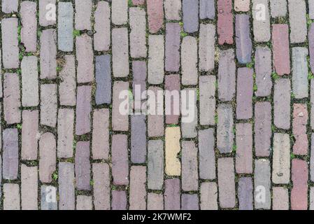 top down view of plastered road, brick background Stock Photo