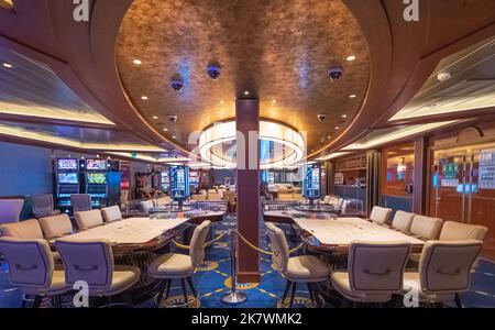 View of the casino and gaming tables inside the Costa Smeralda cruise ship in the port of Marseille, France on 02/10/2022. Stock Photo