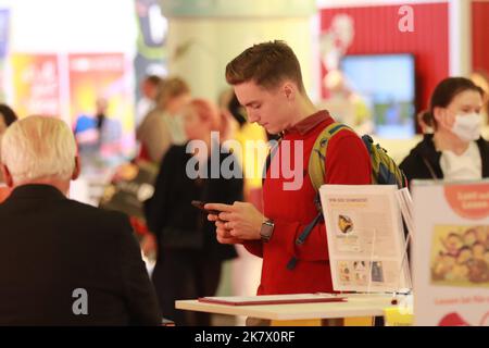 Frankfurt, Germany. 19th Oct, 2022. People visit the 74th Frankfurt Book Fair in Frankfurt, Germany on Oct. 19, 2022. The 74th Frankfurt Book Fair, the largest of its kind in the world, along with numerous stages on the exhibition grounds and more than 2,000 events, opened here on Tuesday evening. Credit: Du Zheyu/Xinhua/Alamy Live News Stock Photo