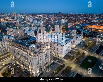 Aerial view at dusk of The Royal Liver Building and Pier Head waterfront Liverpool, Merseyside, England Stock Photo