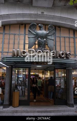 McDonalds fast food restaurant in an art deco styled building, in Porto, Portugal, 16 October, 2022. Stock Photo